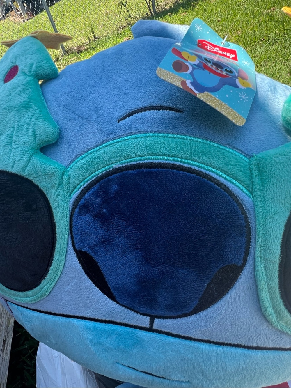 Stitch pillow with Christmas tree glasses
